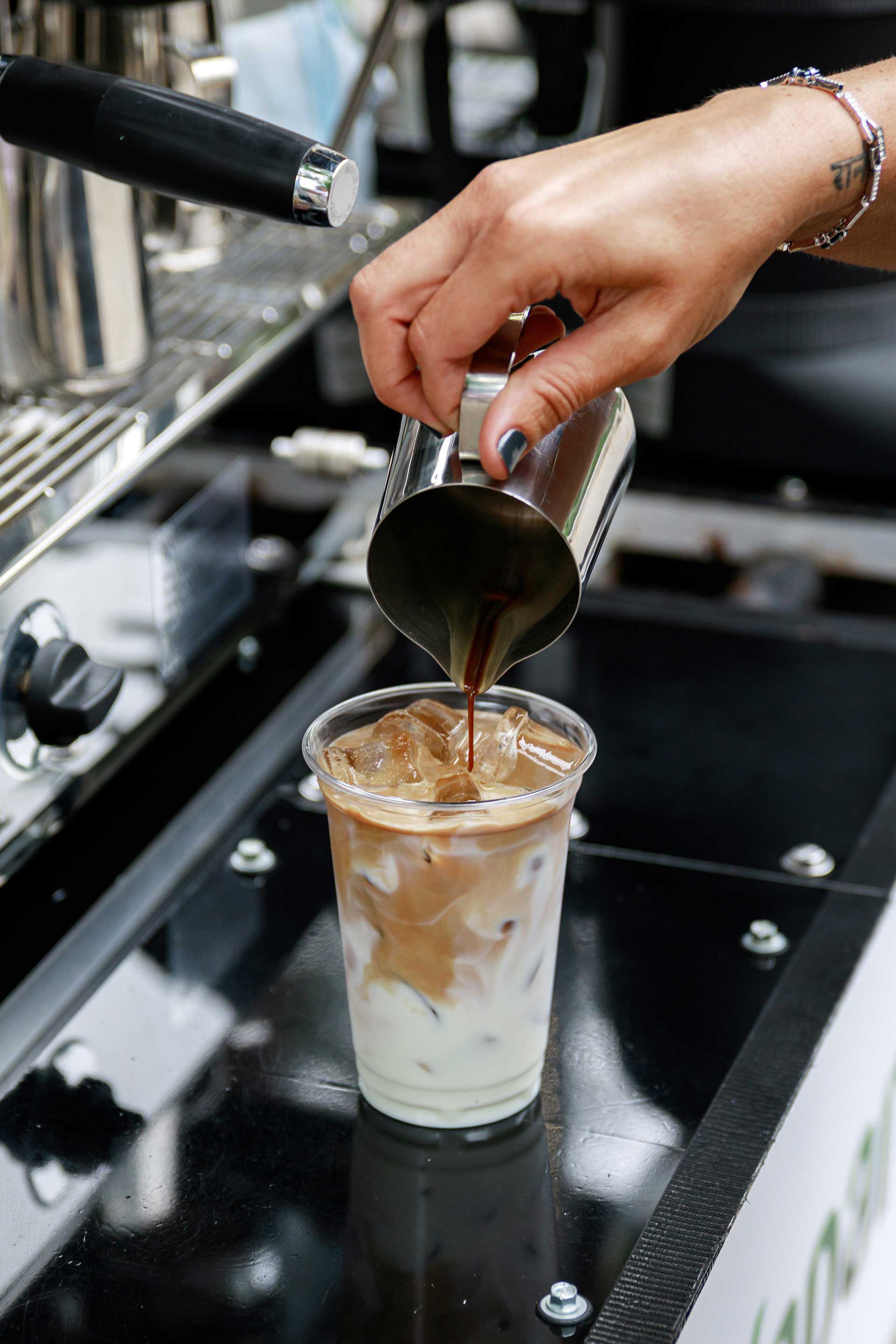 Maple House signature latte with latte art